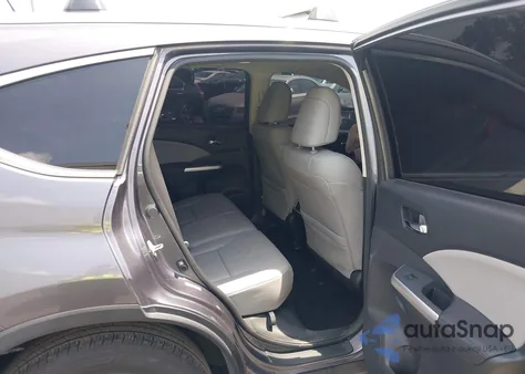 2015 Honda Cr-V Touring z USA, uszkodzony, nr VIN 5J6RM4H97FL125455